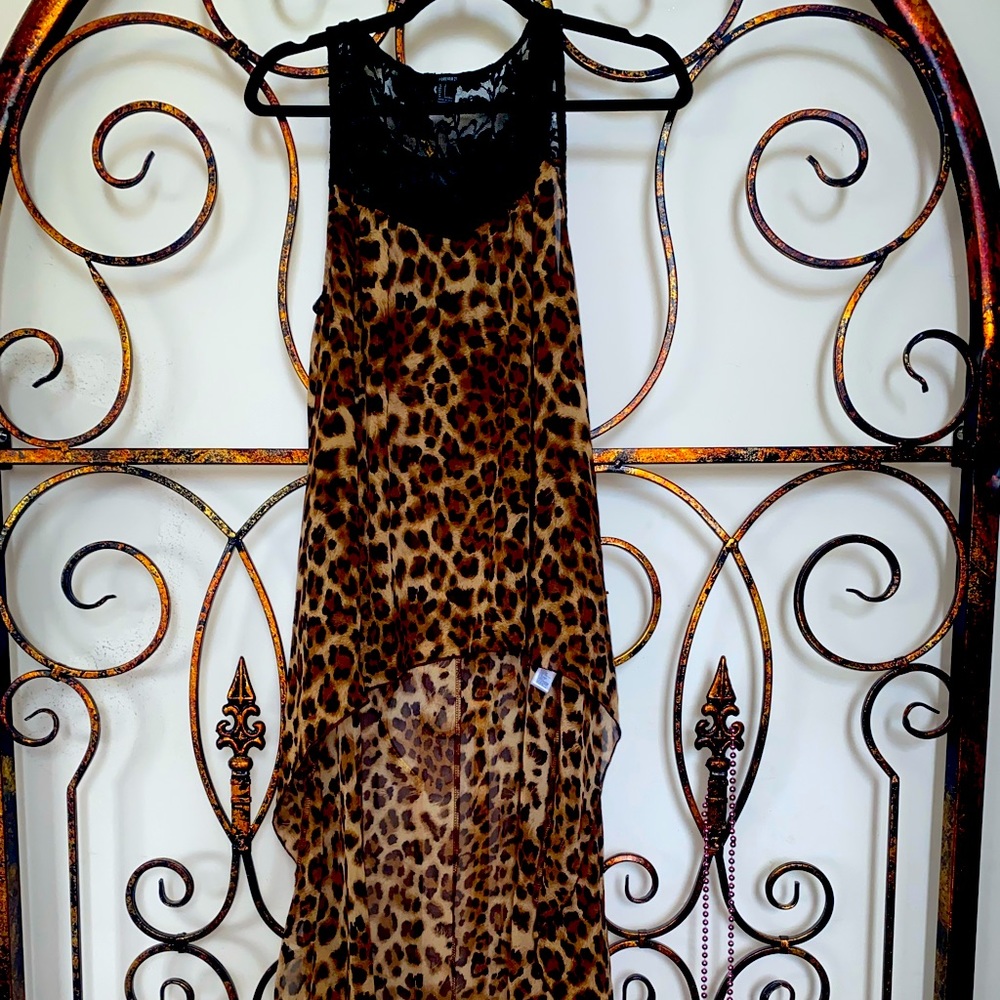 Hi-low sleeveless, sheer, leopard print top